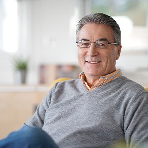 Mature man smiling during dental checkup